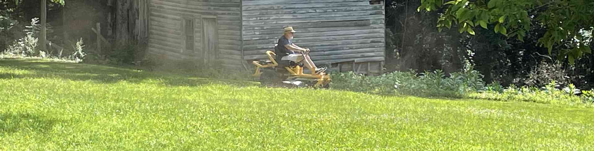 The Sunnyside Sisters Bed and Breakfast / Clarksville VA / Brad on his lawnmower