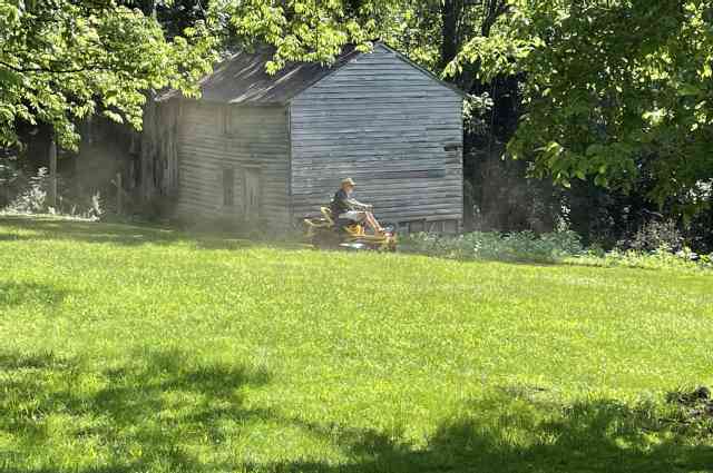 The Sunnyside Sisters Bed and Breakfast / Clarksville VA / Brad on his lawnmower