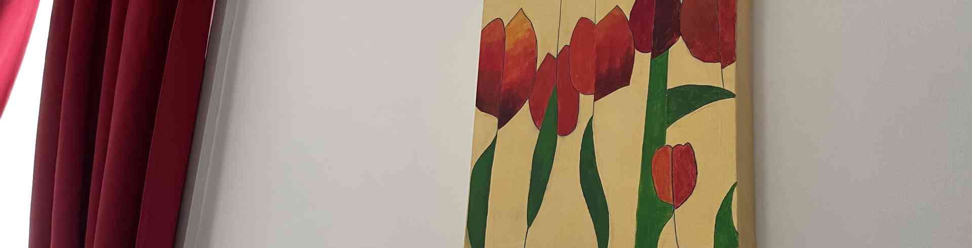 The Sunnyside Sisters Bed and Breakfast / Clarksville VA / Red tulips with gold for the red room