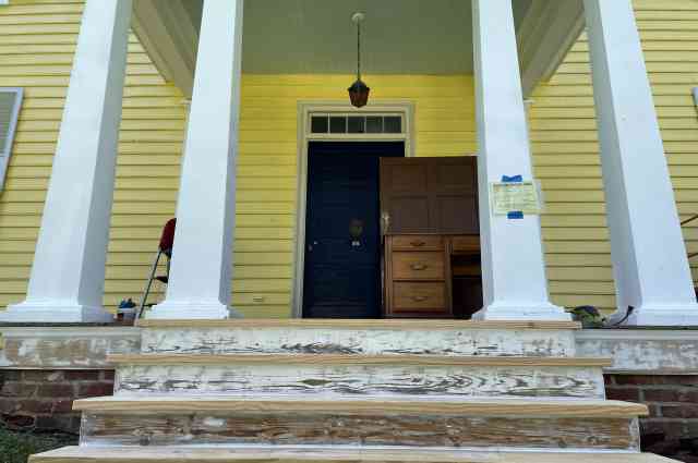 The Sunnyside Sisters Bed and Breakfast / Clarksville VA / Haint blue ceiling and dark blue front door