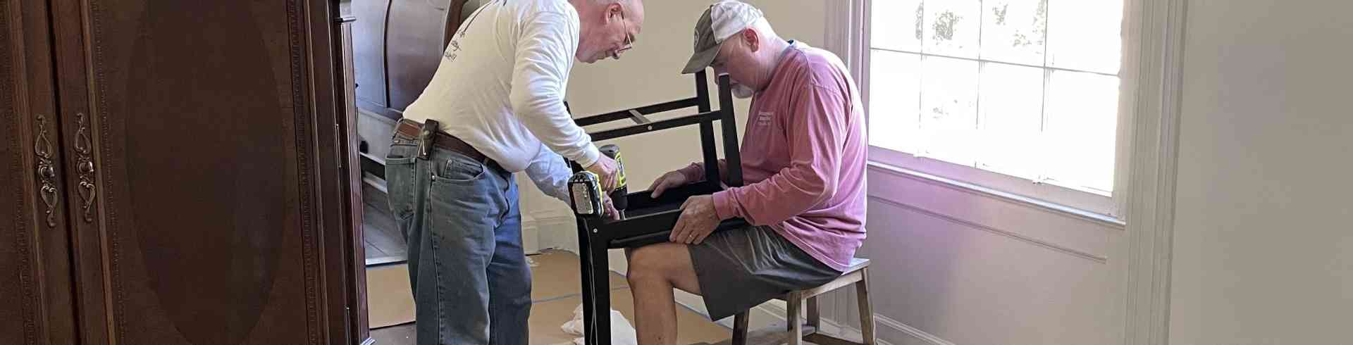 The Sunnyside Sisters Bed and Breakfast / Clarksville VA / Ron and Brad assembling breakfast room furniture
