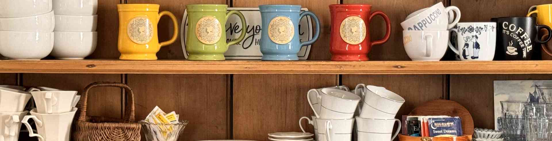 The Sunnyside Sisters Bed and Breakfast / Clarksville VA / The Sunnyside Sisters B&B Coffee Mugs in our Breakfast room cabinet