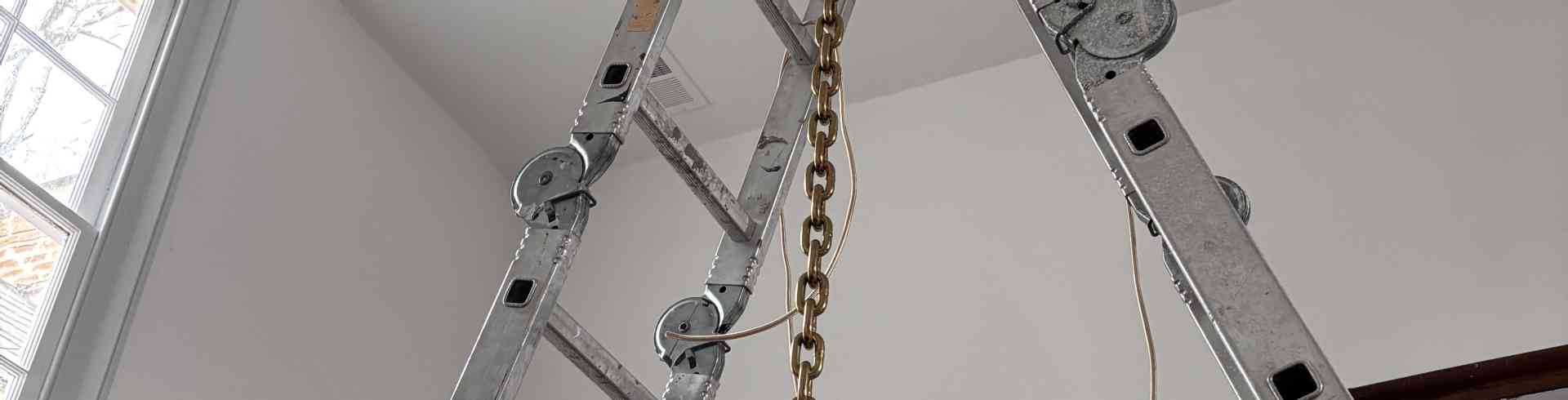 The Sunnyside Sisters Bed and Breakfast / Clarksville VA / Attaching the chain to the beam on the attic
